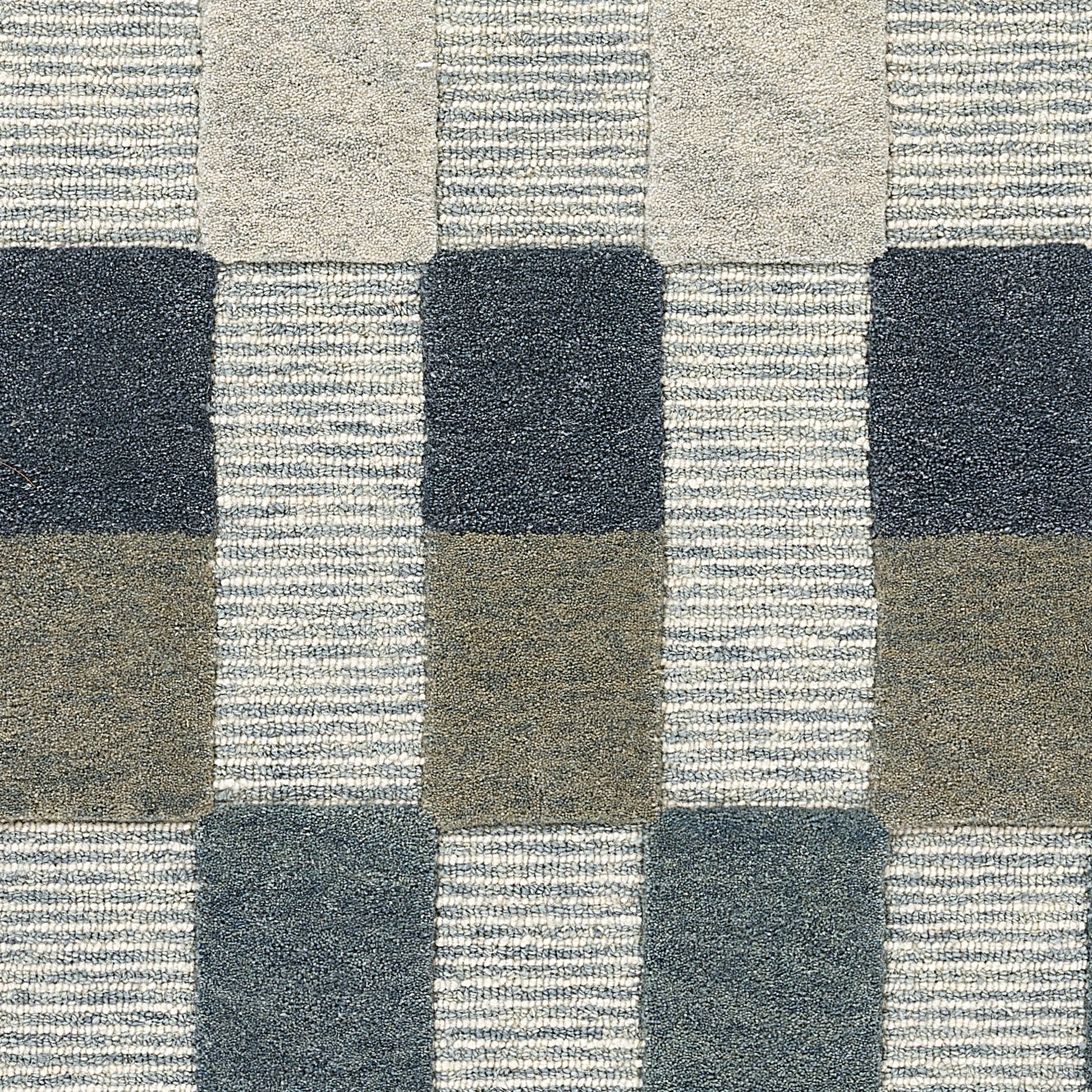 Blue-gray plaid fleece blanket with square blocks in navy, taupe and light gray; cozy throw.