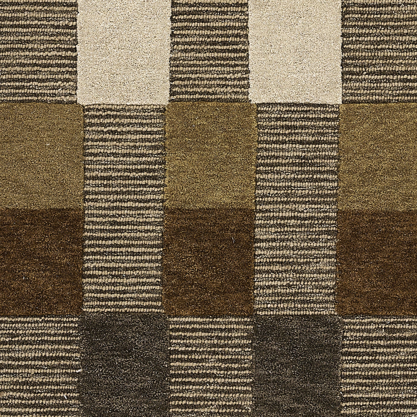 Brown & beige carpet tile with a checkerboard of solid & striped squares, textured loop-pile.