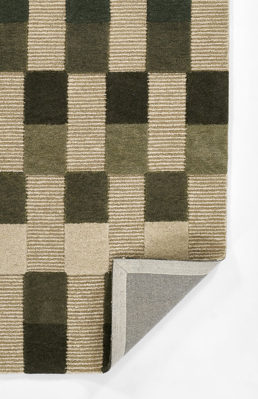 Geometric area rug with olive-green and beige checkerboard squares, striped texture, folded corner revealing gray backing.