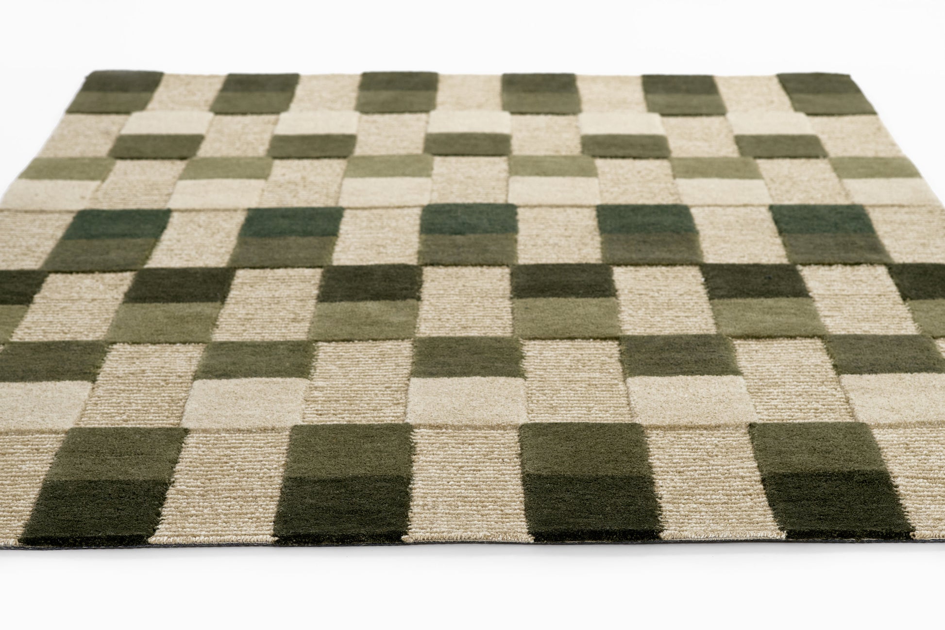 Checkerboard area rug in olive green and beige; flat-weave shag with square blocks.