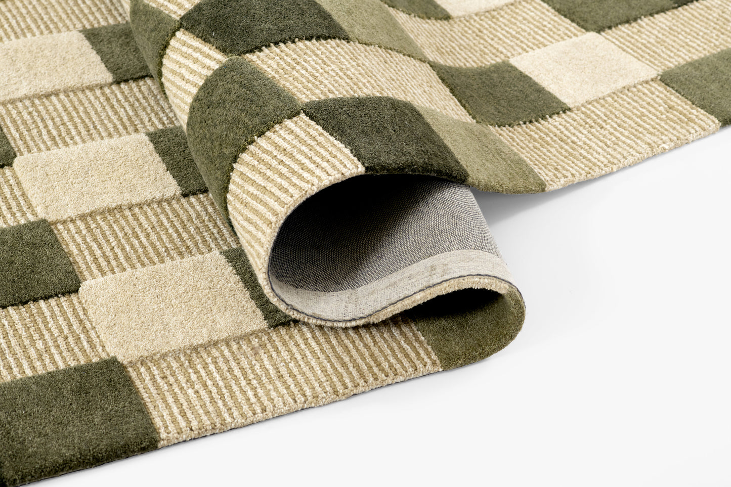 Woven olive green and beige checkered rug with rolled edge, showing underside.