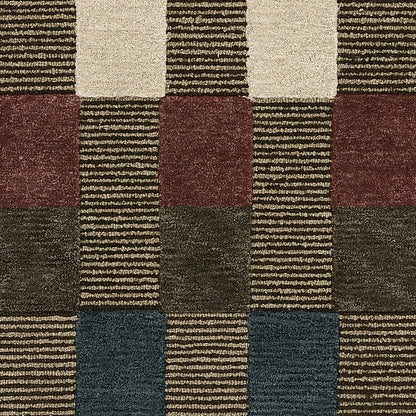 Geometric rug with alternating blocks of cream, beige, burgundy, brown & navy, featuring striped textures.