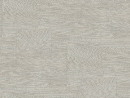 Grey geometric wallpaper with a subtle stone texture in a brick-like grid pattern.