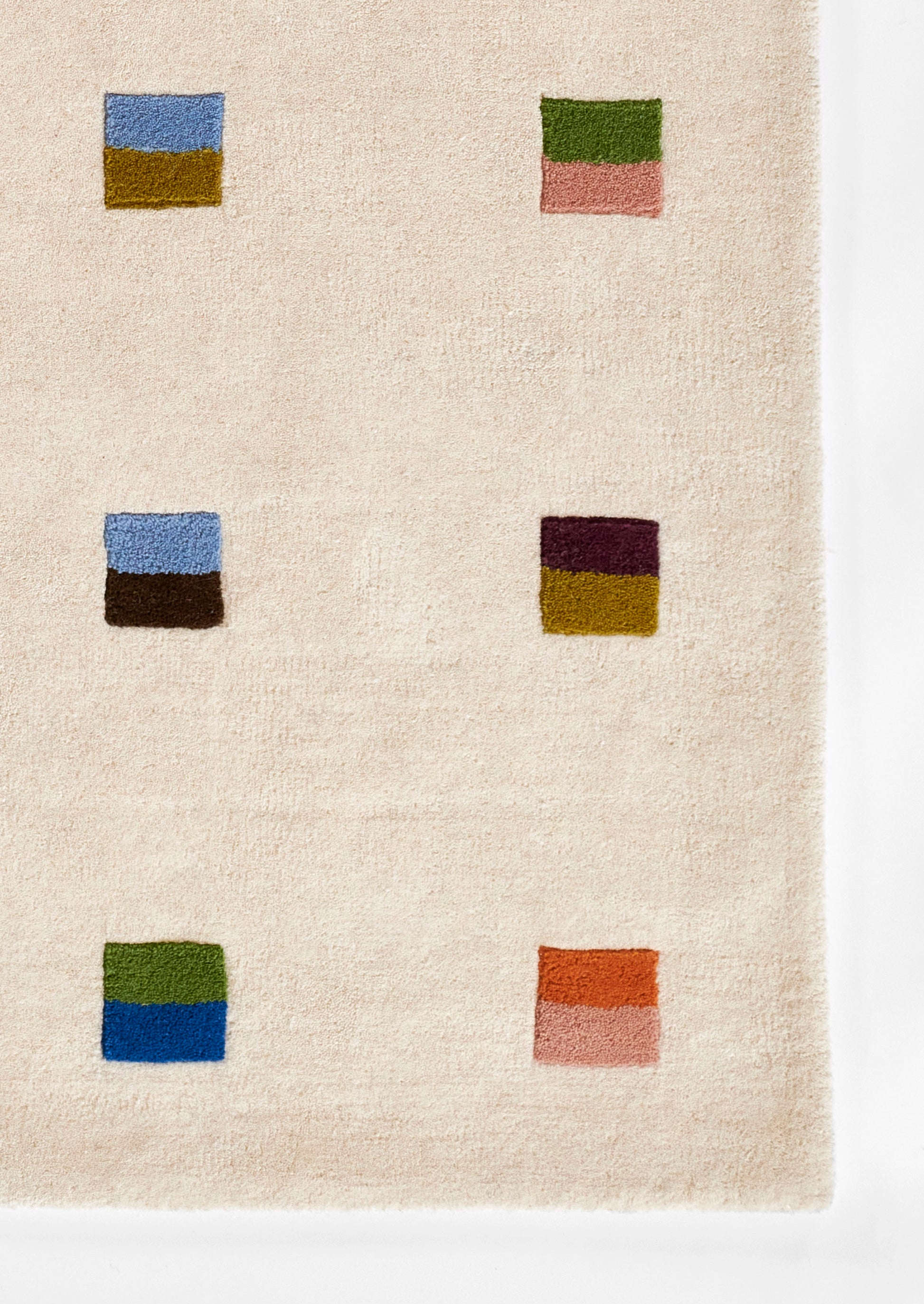 Beige woven runner rug with a 3x2 grid of small two-tone squares in blue, green, orange, pink, purple