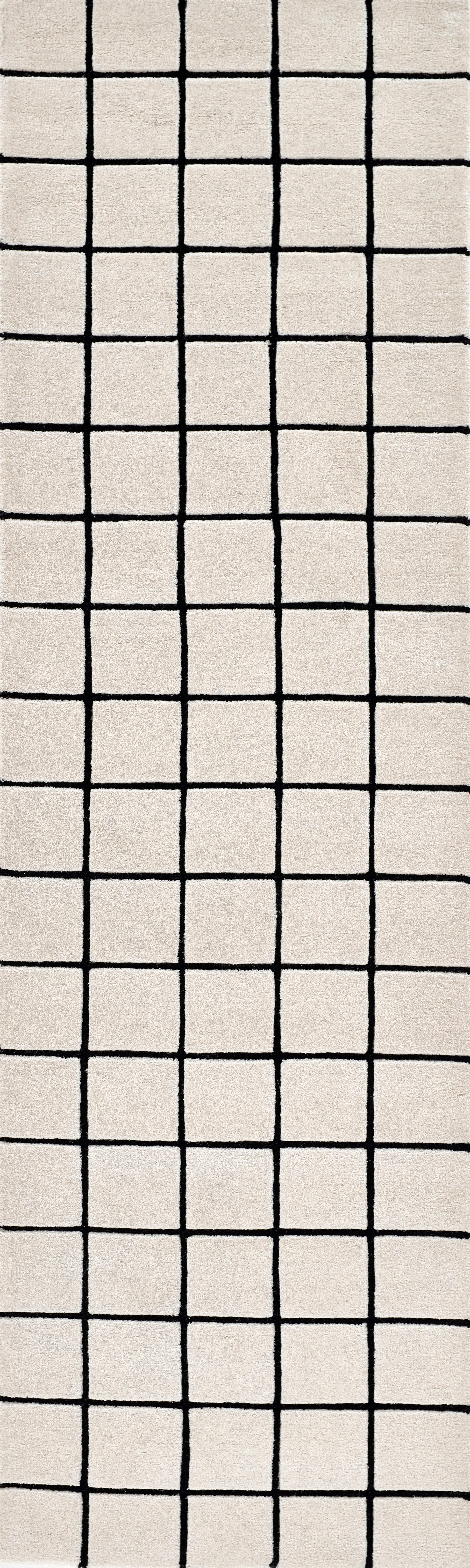 Beige woven rug with a bold black square grid pattern, modern geometric design.
