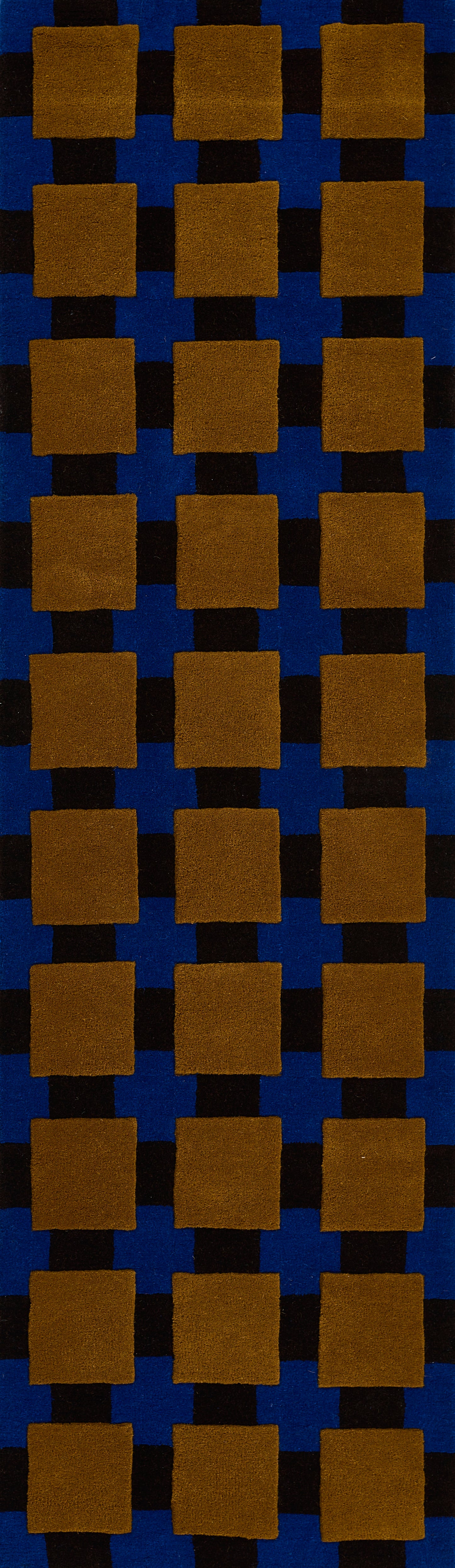 Orange-brown square tiles in a grid on a dark blue backdrop; bold geometric pattern.