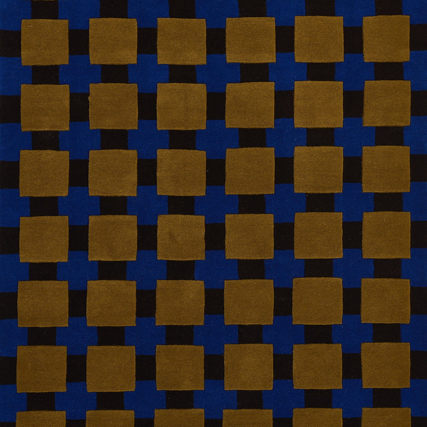 Brown square patches on a deep blue background in a repeating grid; geometric woven fabric pattern for upholstery.