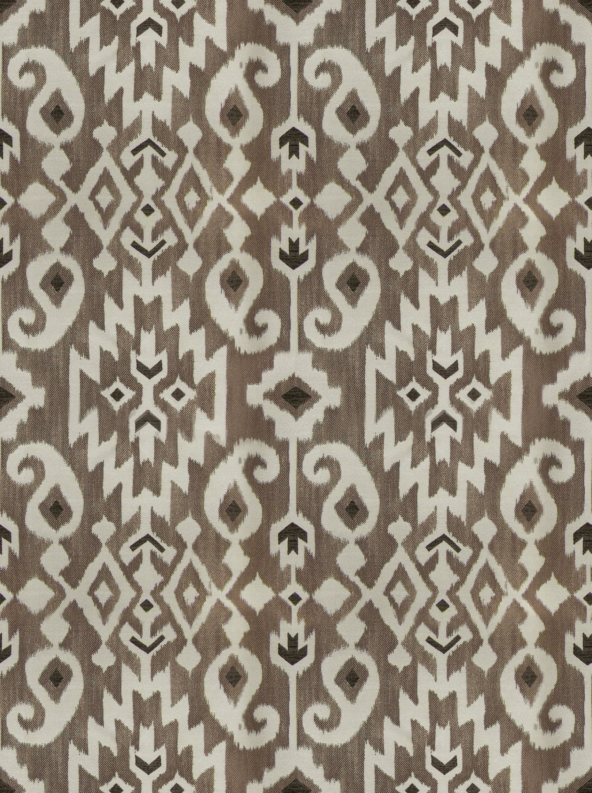 Brown & beige ikat-inspired geometric fabric pattern with diamond & scroll motifs for upholstery.