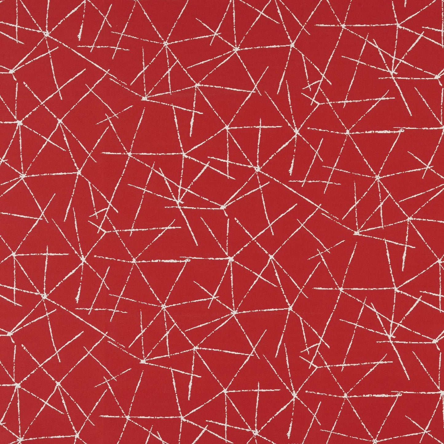 Red background with white irregular fracture lines forming a geometric abstract pattern on a contemporary woven fabric.