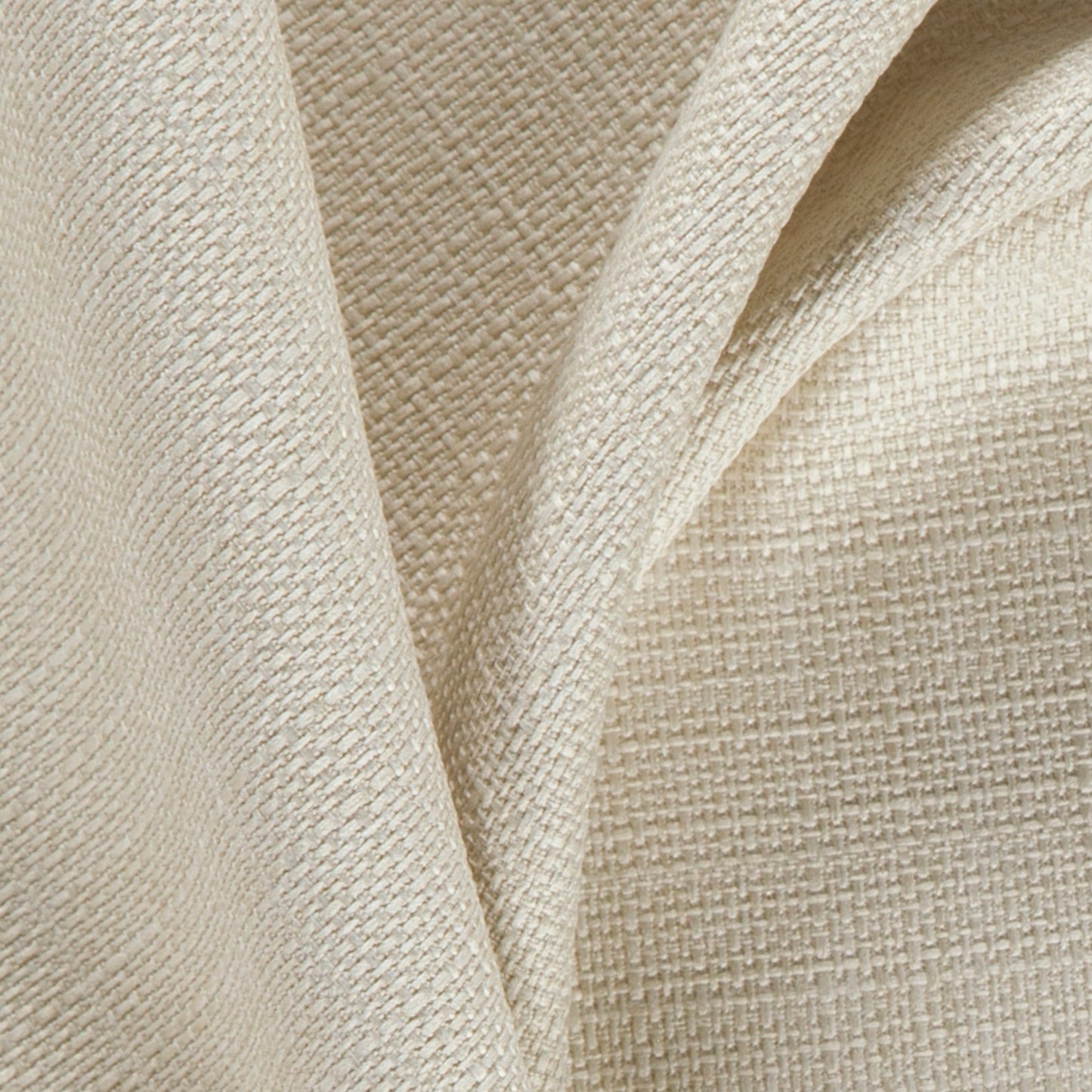 Beige linen-textured fabric with a subtle grid pattern and soft draped folds.