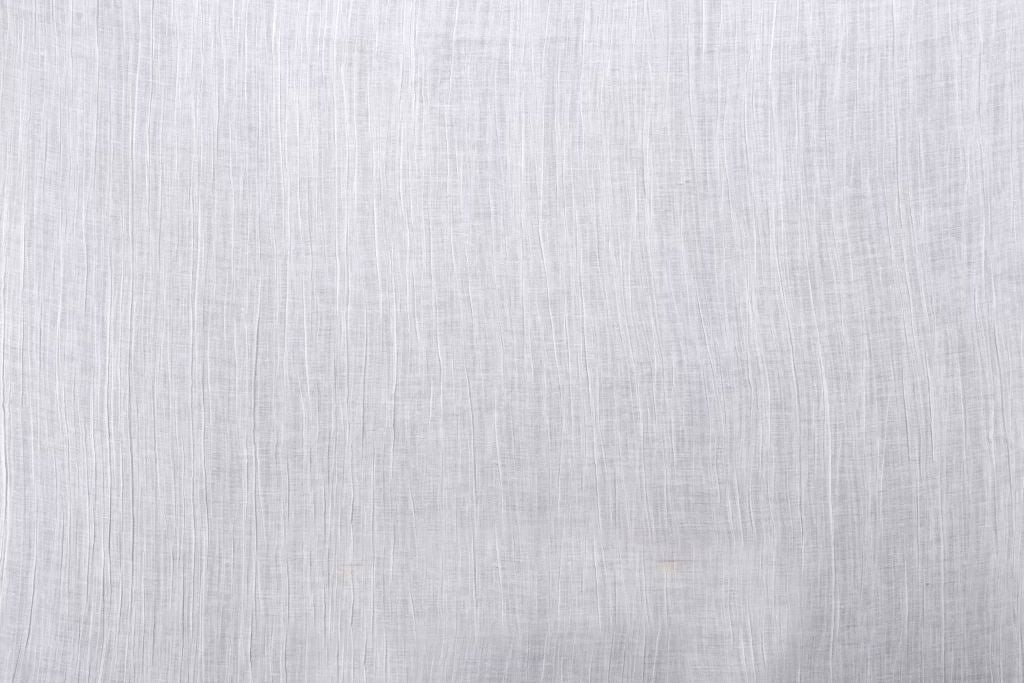 Beige sheer fabric with visible weave and subtle vertical lines.