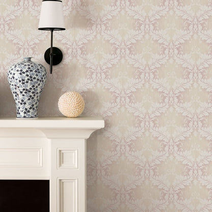 Pink embossed damask wallpaper.
