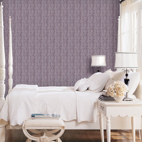 Purple lilac metallic damask wallpaper on the wall.