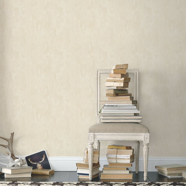 Cream plain-texture wallpaper on a beige wall.