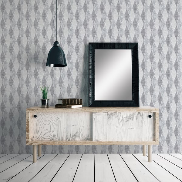Silver grey wallpaper with a teardrop leaf pattern on the wall