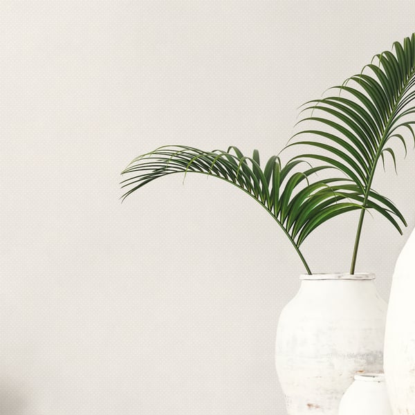 Wallpaper with a small shell-print pattern in bronze and brown tones.