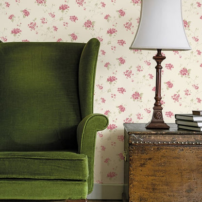 Lilac floral wallpaper on a cream background.
