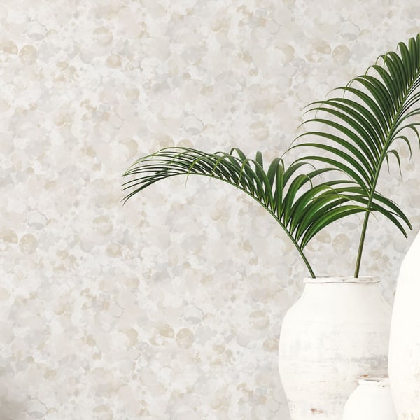 Beige wallcovering with a subtle textured pattern.