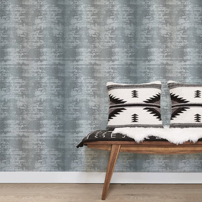 Silver Grey wallpaper with a geometric weave pattern on a wall