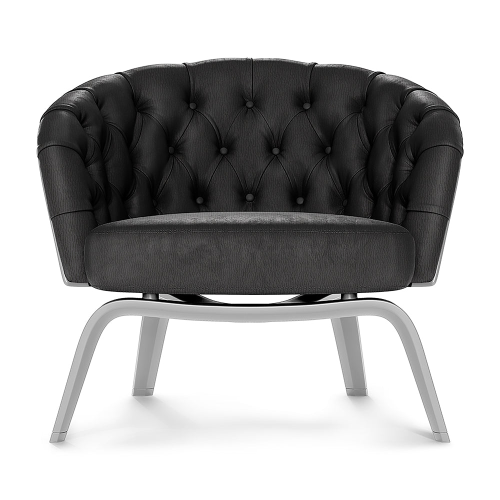 Black tufted fabric lounge chair with buttoned back and curved metal legs, modern luxury seating.
