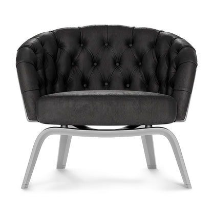 Black tufted fabric lounge chair with buttoned back and curved metal legs, modern luxury seating.