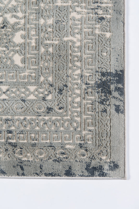 Rectangular grey and ivory rug with Greek key border, geometric motifs and distressed antique look.