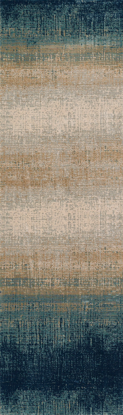 Rectangular gradient rug with deep teal edges fading to beige center, distressed vintage texture.
