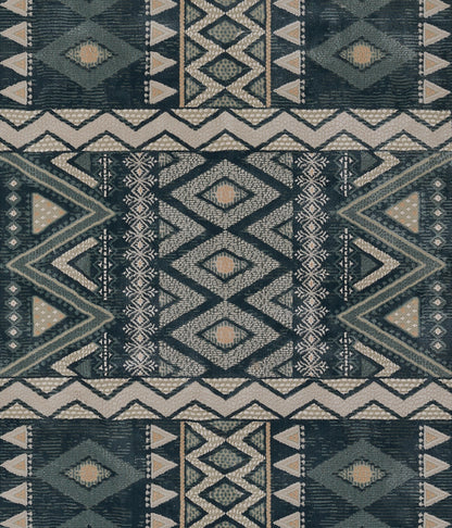 Kilim-style woven rug in navy, teal and cream with bold diamonds and chevrons, geometric tribal pattern.