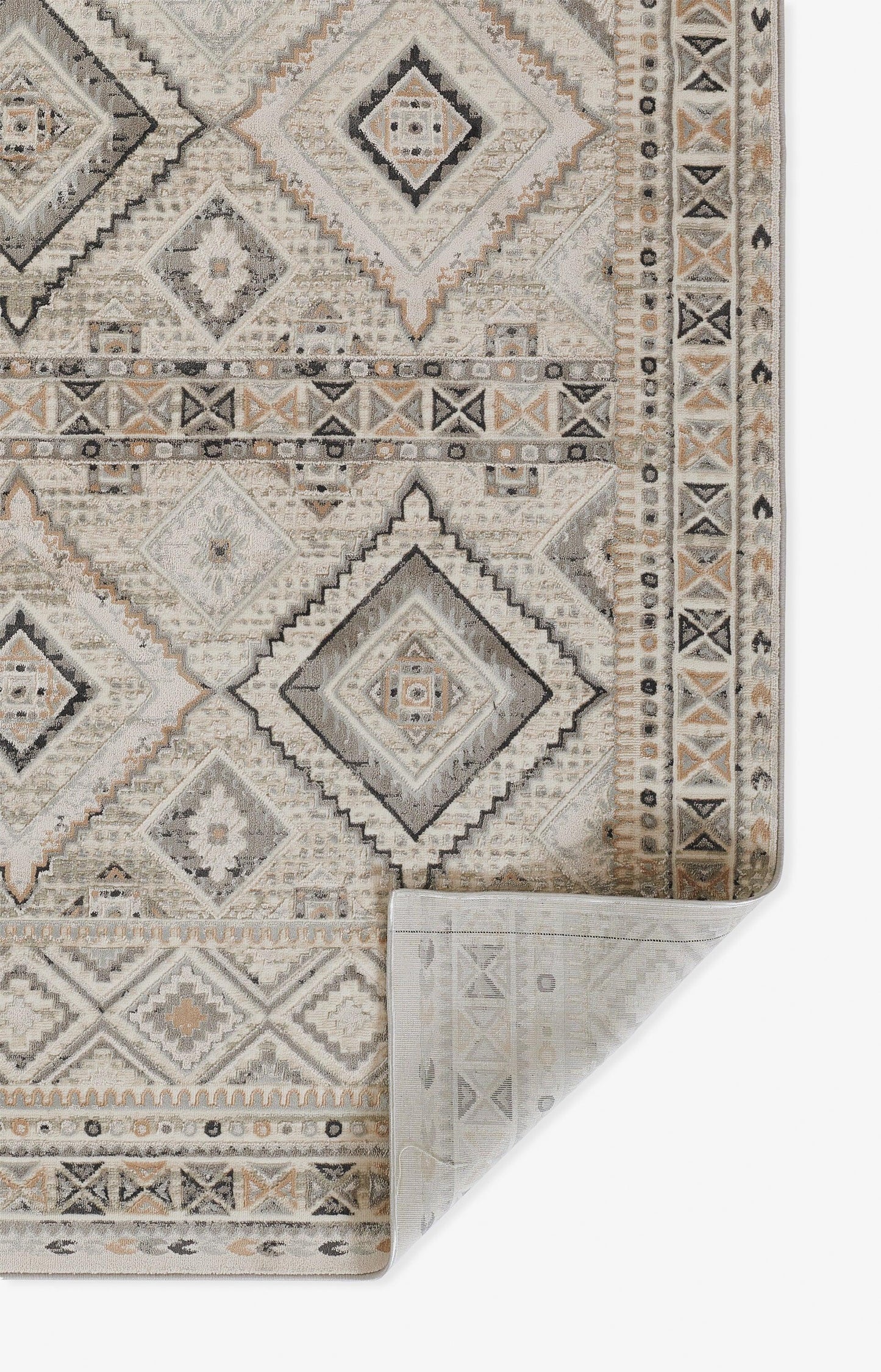 Neutral ivory-gray geometric rug with diamond medallions and borders; folded corner reveals the underside.