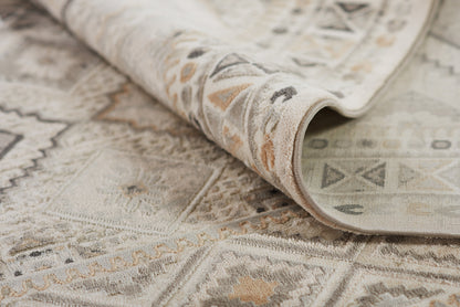 Neutral geometric rug in ivory, beige and gray; woven low-pile with tribal motifs, rolled edge; 2' x 3'.
