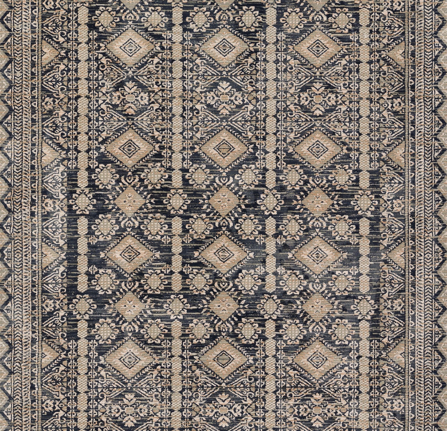Navy and beige oriental rug with repeating geometric diamond medallions and floral motifs; dense woven pattern.