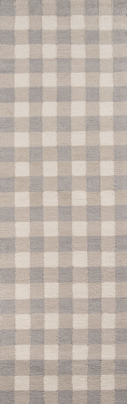 Beige and gray checkered rug; square grid pattern; soft woven textile for home decor.
