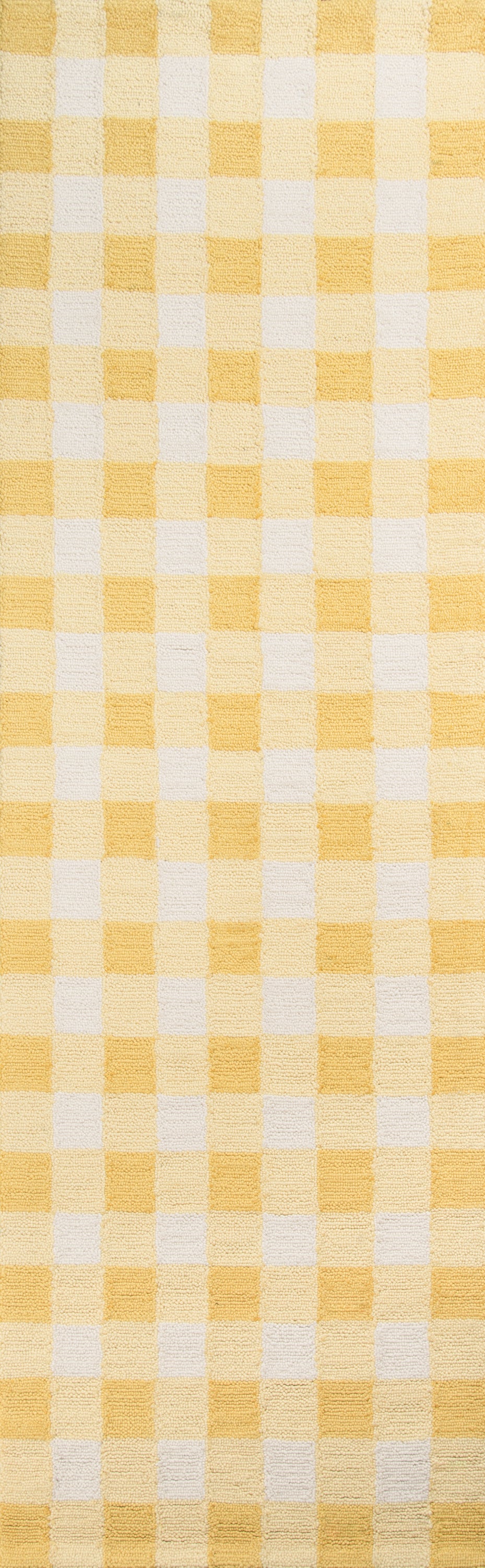Yellow and white gingham check rug.