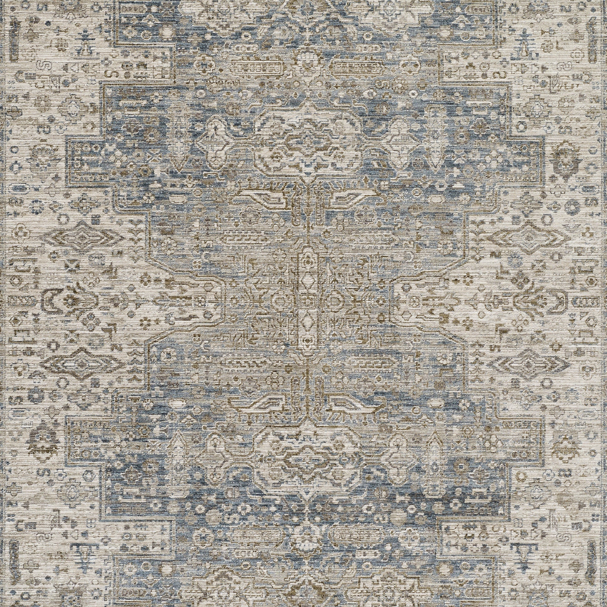 Distressed blue & beige oriental area rug with central medallion & geometric border, vintage-inspired.