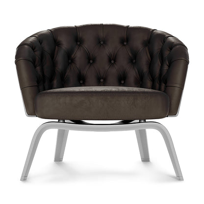 Dark brown button-tufted fabric lounge chair with rounded back and light gray metal legs.