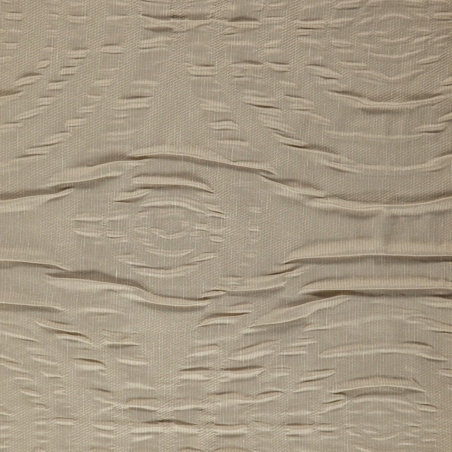 Beige embossed matelassé jacquard fabric with irregular wavy stripe pattern for upholstery & drapery.
