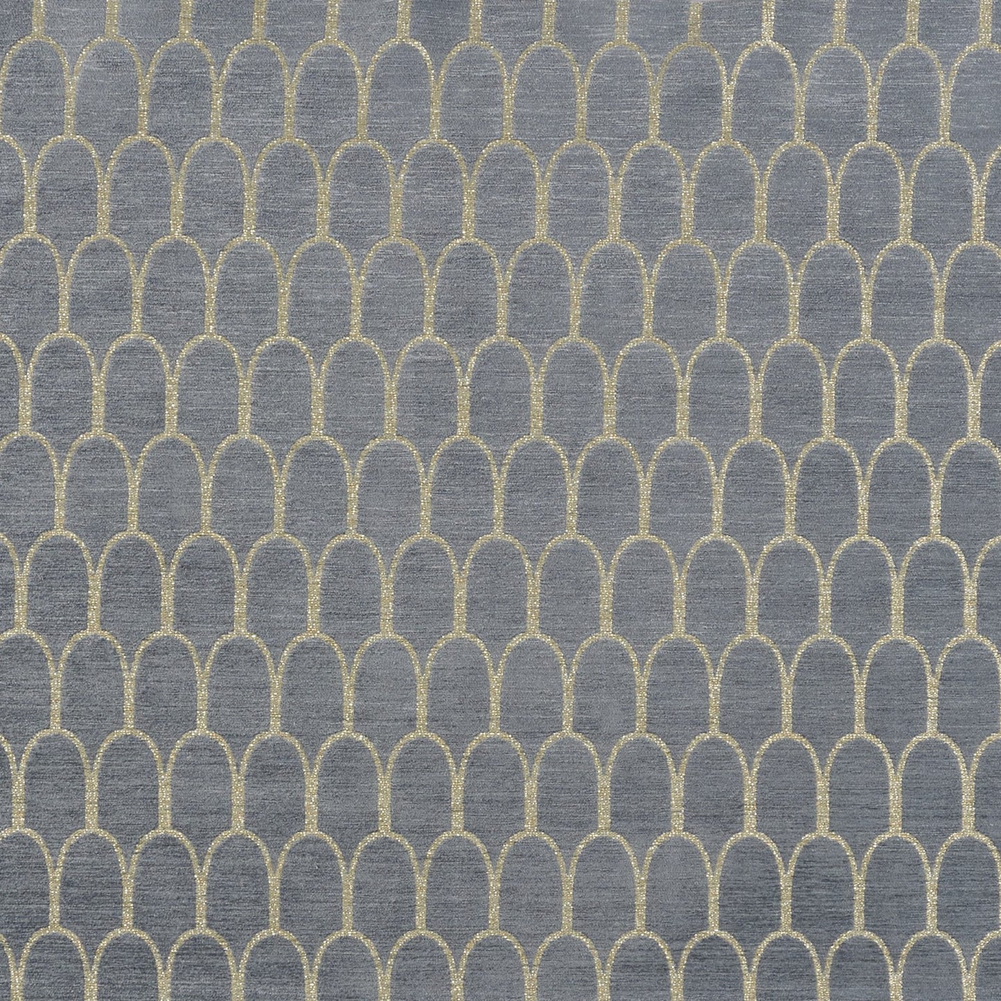 Blue-gray fabric with a glittery gold scallop arch pattern repeating across.