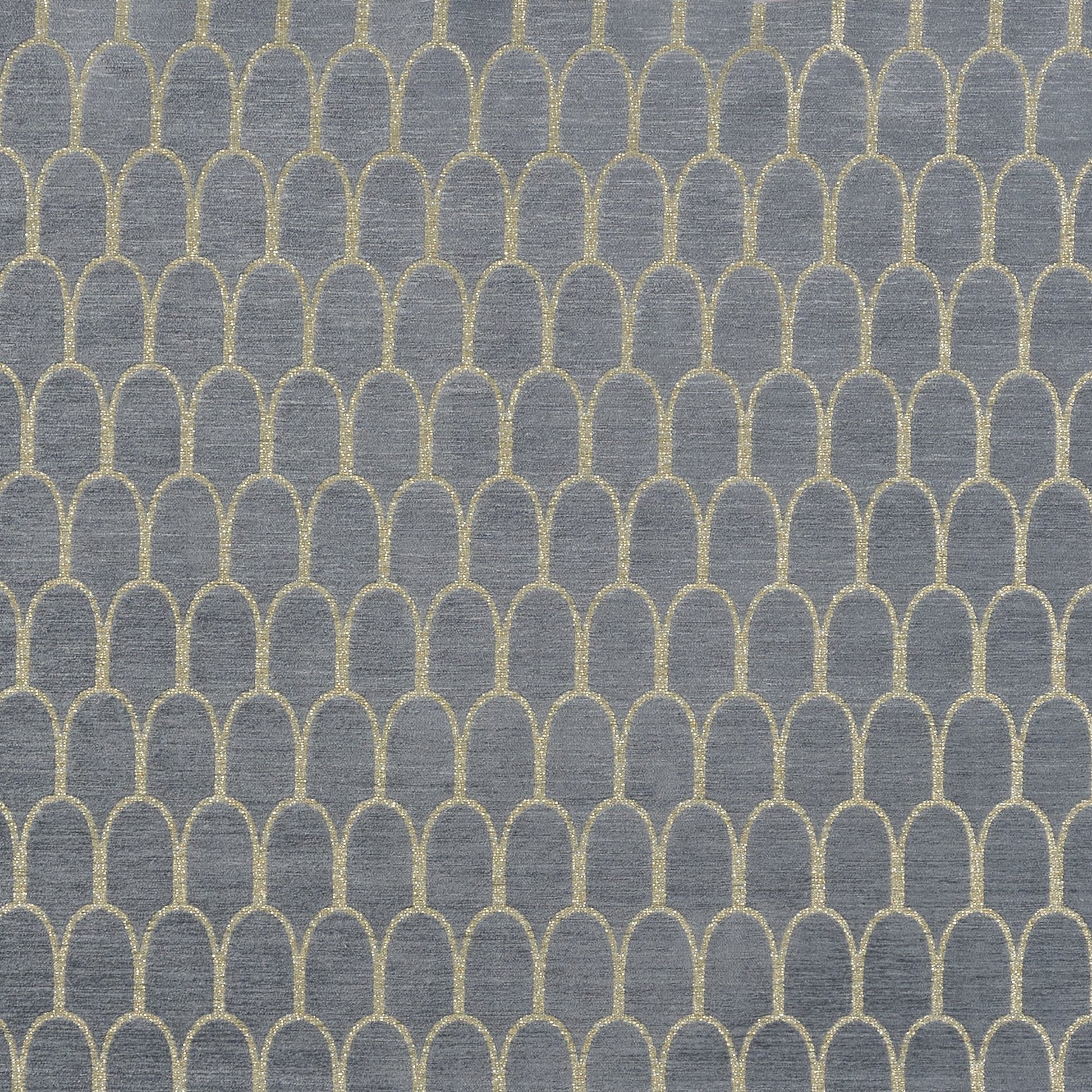Blue-gray fabric with a glittery gold scallop arch pattern repeating across.