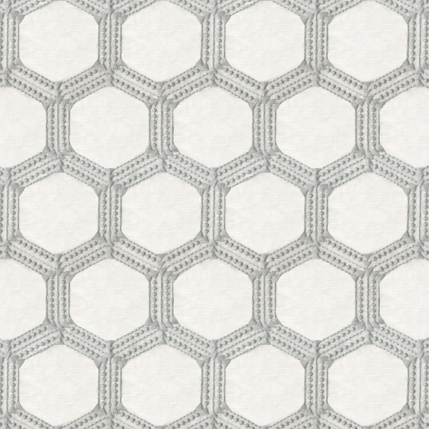 Gray geometric hexagon lattice with dotted borders on a linen-textured off-white fabric.