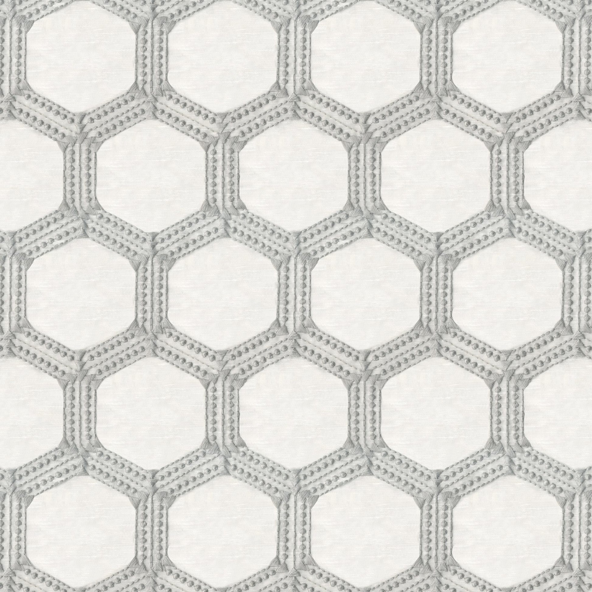 Gray geometric hexagon lattice with dotted borders on a linen-textured off-white fabric.