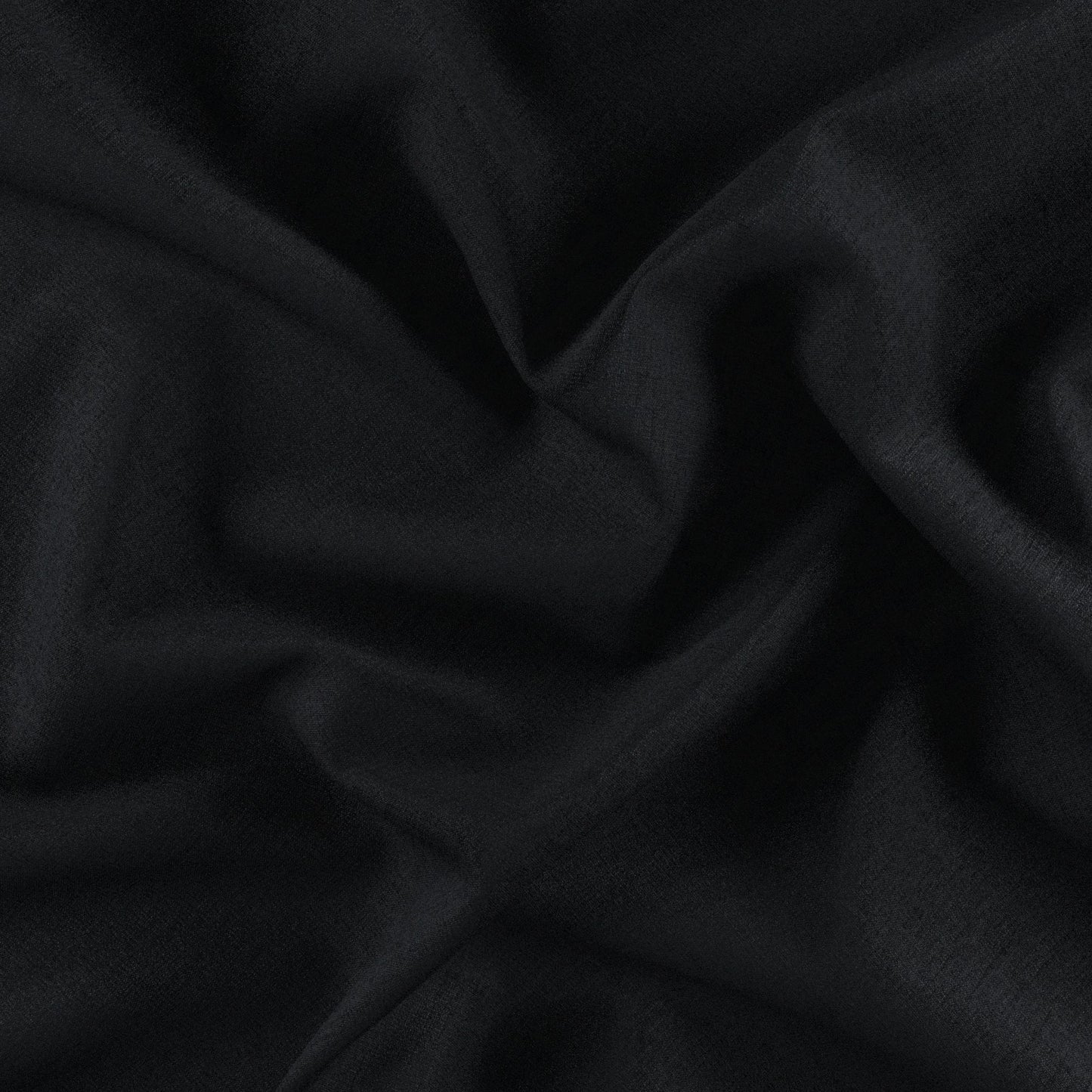 Black chenille fabric with plush texture, draped in soft folds; matte finish.
