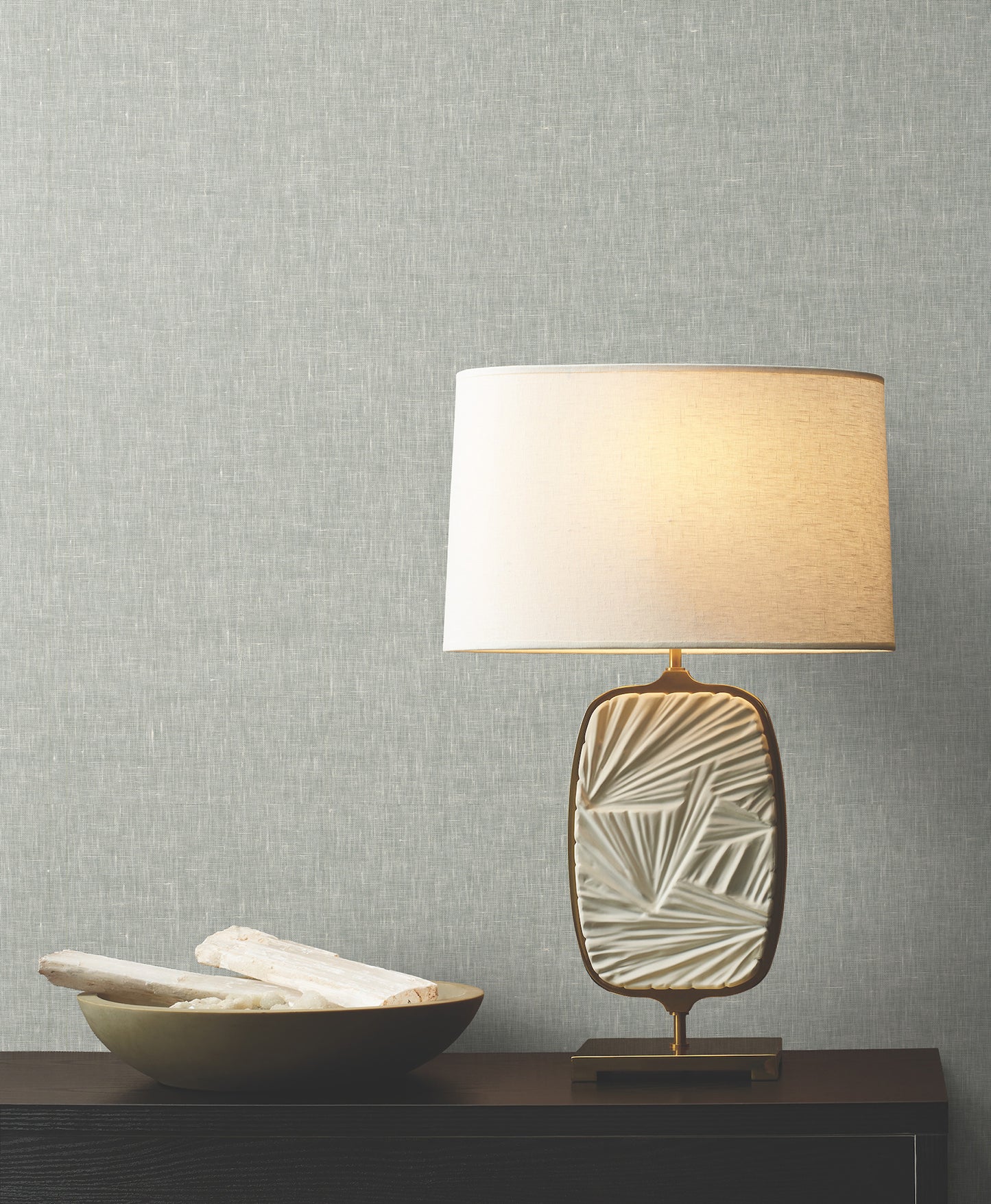 Room featuring sheer linen-style wallpaper in ash tones with a subtle woven texture.