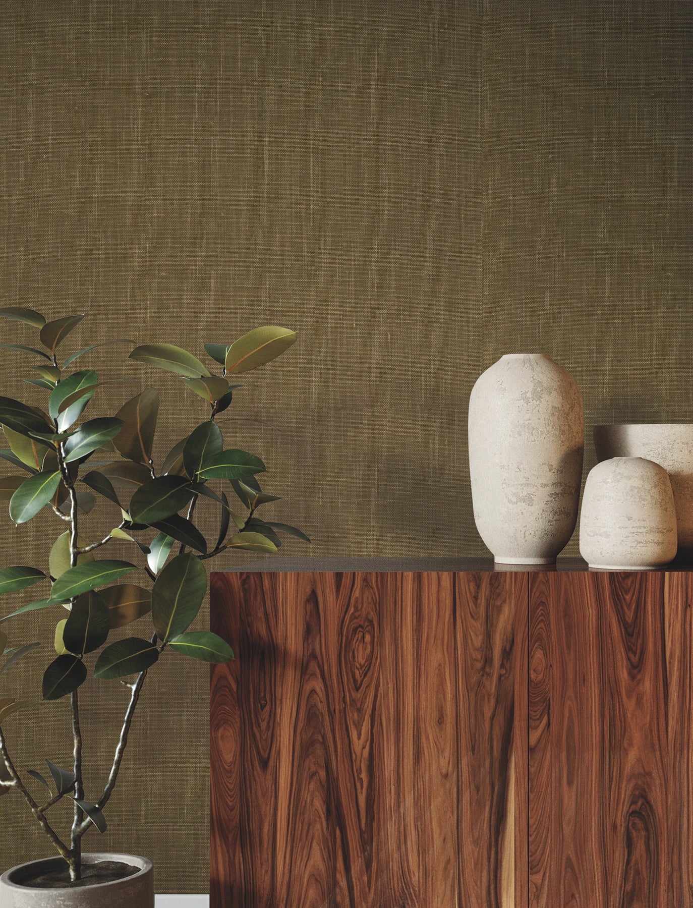 Dark wood cabinet with cream ceramic vases and a leafy plant against an olive textured wall.
