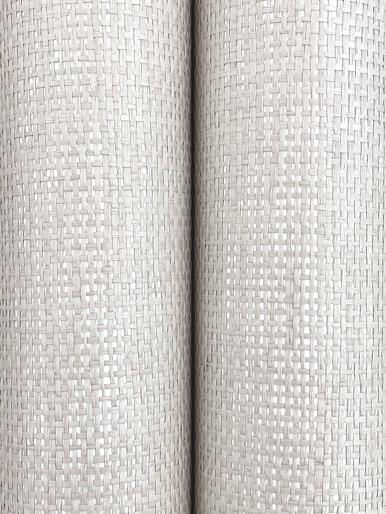 Silver gray paperweave wallpaper close-up; airy woven texture with two rolled panels side by side.
