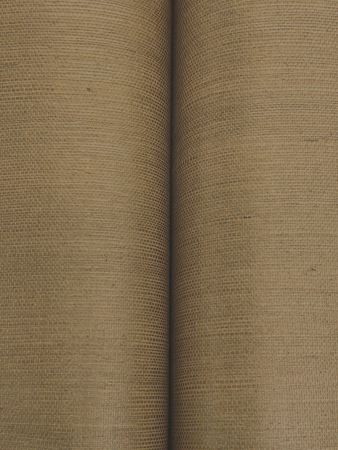 Two beige toffee grasscloth wallpaper rolls with a chunky woven texture; natural rustic close-up.