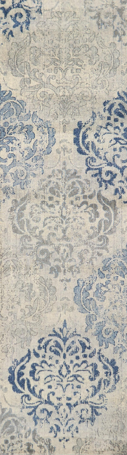 Transitional rug runner, 2' x 8', with a subtle neutral pattern.