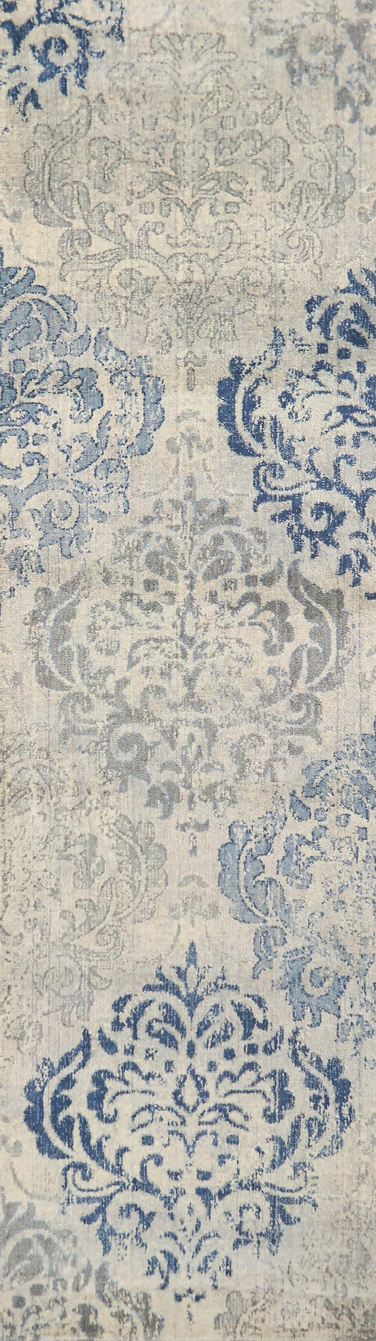 Transitional rug runner, 2' x 8', with a subtle neutral pattern.