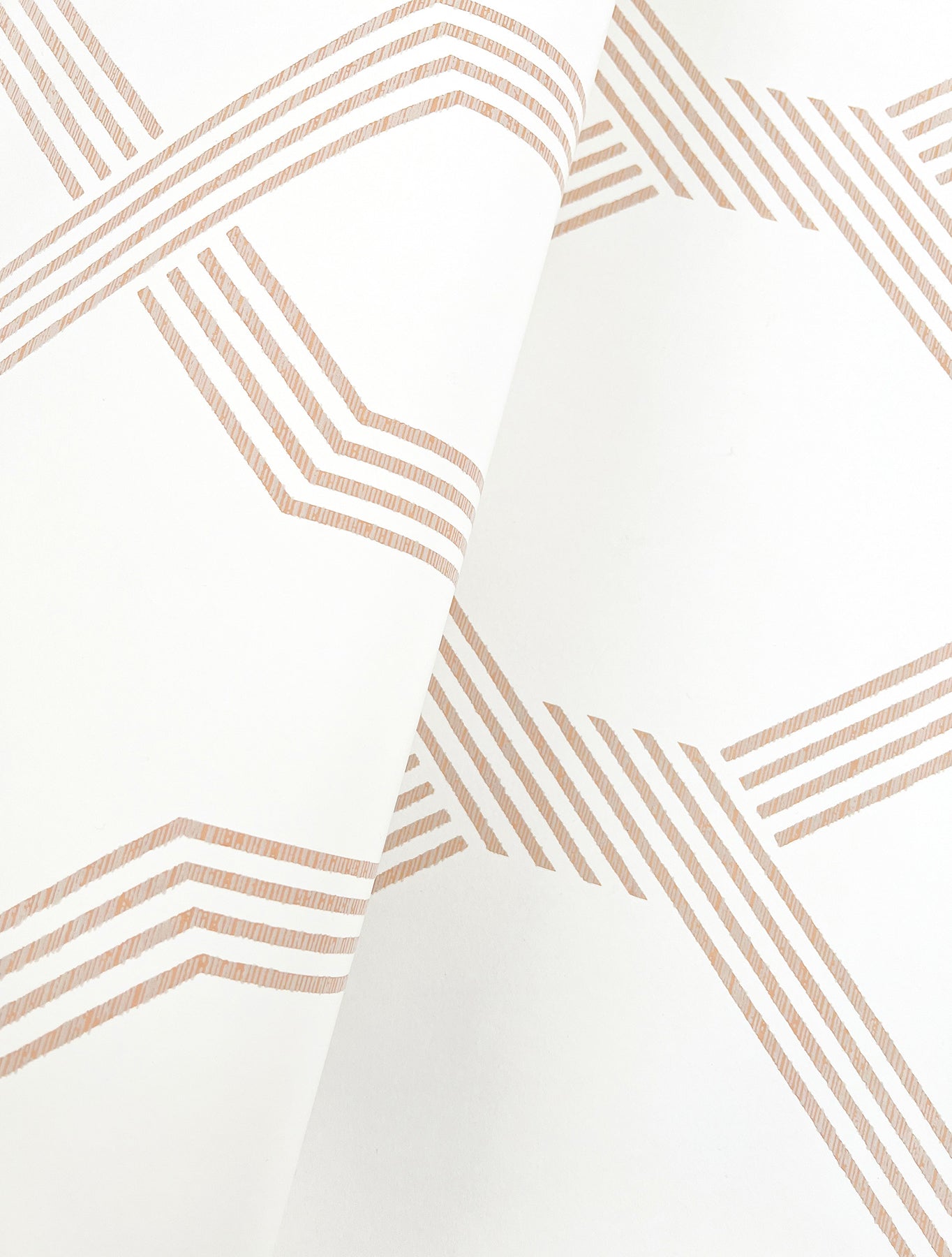 Soft coral orange on white geometric diamond/ribbon-stripe wallpaper pattern GT4554 from York Wallcoverings’ Classics collection, non-woven, washable & strippable.