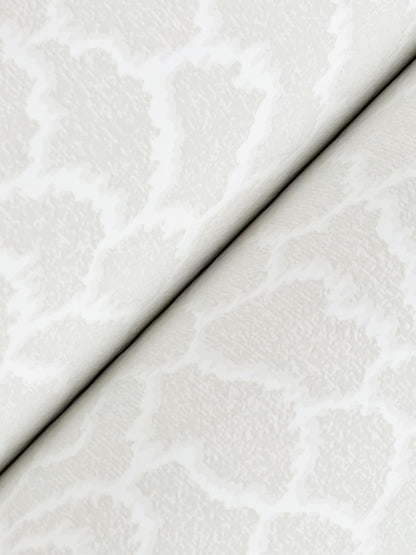 Ivory damask-patterned wallpaper with a subtle floral motif in whites and off-whites.