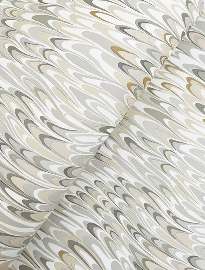 Close-up marbled swirl pattern on wallpaper in beige, ivory, taupe and gray.